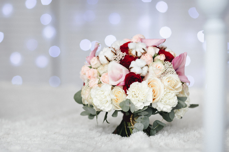Pink wedding bouquet with cotton flowersの写真素材