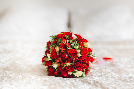 wedding bouquet with white and red flowersの写真素材