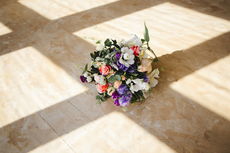 Wedding bouquet lying on the floorの写真素材