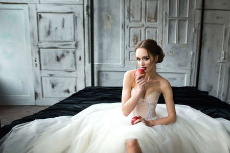 Portrait of a beautiful bride. Bride's fees in the studioの写真素材