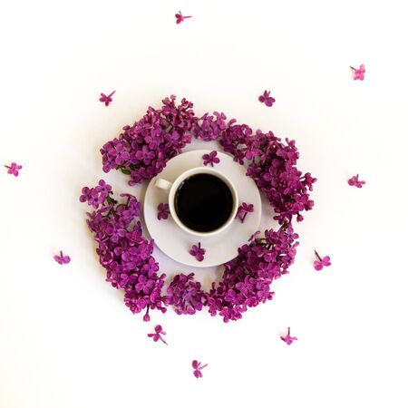 Top view of Cup with lilac on white backgroundの写真素材
