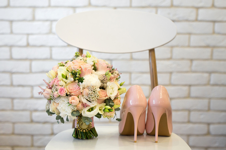beautiful wedding bouquet lies on a chair. Wedding details.の写真素材