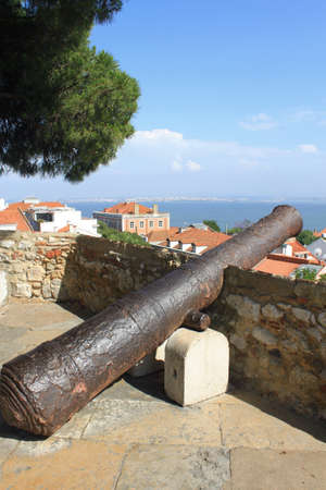 View of Lisbon with an old cannon, Portugalのeditorial素材