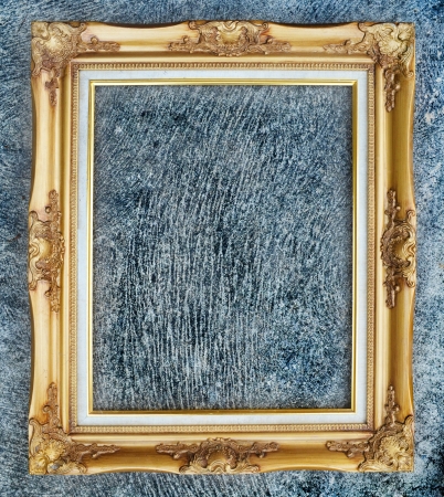 Old picture frame on wall の写真素材