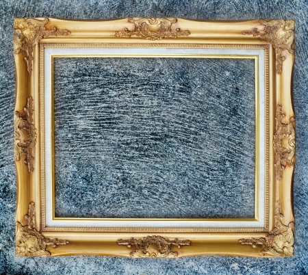 Old picture frame on wall の写真素材
