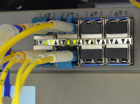 optic fiber cables connected to data centerの写真素材