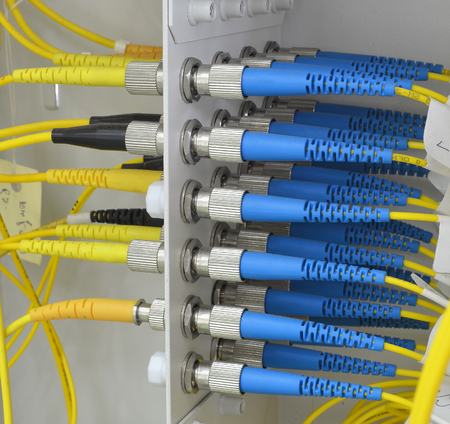 optic fiber cables connected to data centerの写真素材
