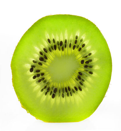 Whole kiwi fruit and his sliced segments isolated on white background cutoutの写真素材