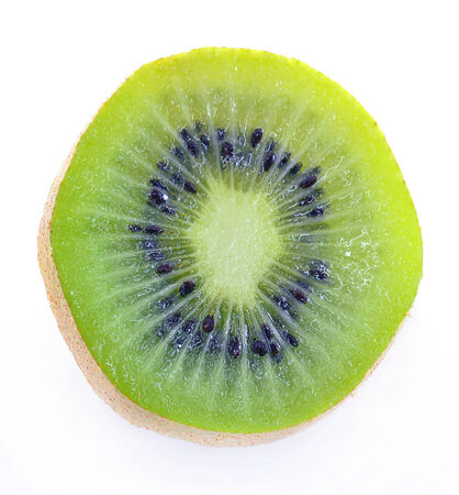 Whole kiwi fruit and his sliced segments isolated on white background cutoutの写真素材