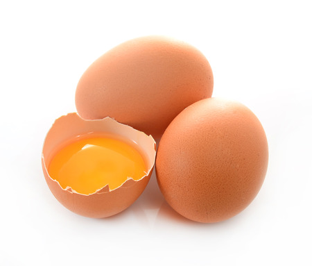 Broken egg isolated on white backgroundの写真素材