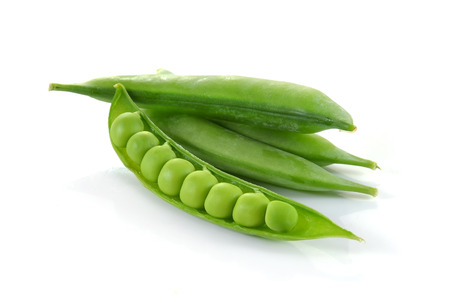 fresh green peas isolated on a white background. Studio photoの写真素材