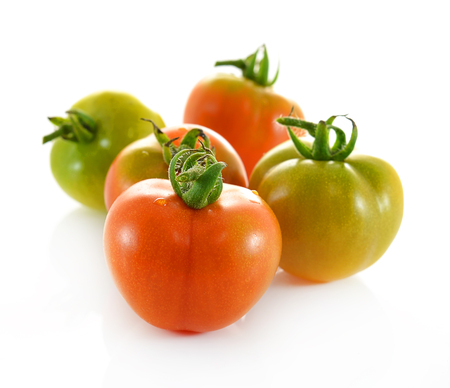 Red tomato vegetable on white background.の写真素材