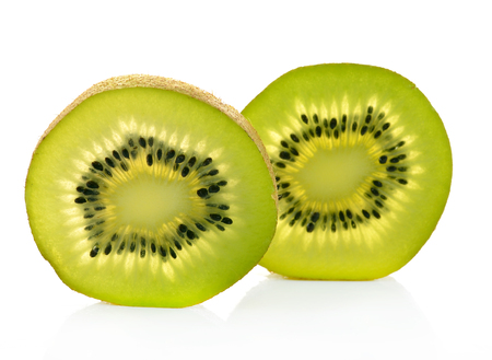 Whole kiwi fruit and his sliced segments isolated on white background cutoutの写真素材