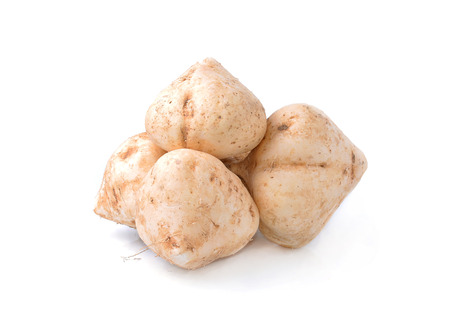 Whole Jicama isolated on white backgroundの写真素材