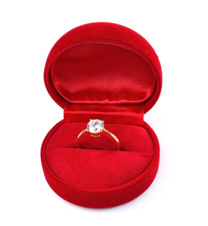 Diamond ring in red box isolated on white backgroundの写真素材