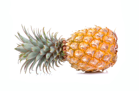 Juicy ripe sliced pineapple isolated on white backgroundの写真素材