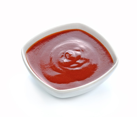 ketchup or chili sauce  isolated on white backgroundの写真素材