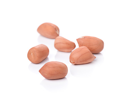 peanuts isolated on white backgroundの写真素材