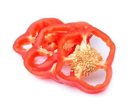 red pepper slices on white backgroundの写真素材
