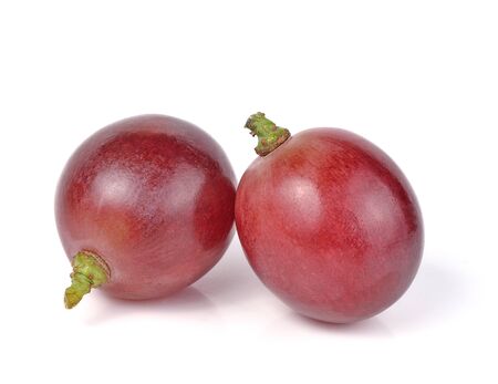 red grapes isolated on white backgroundの写真素材
