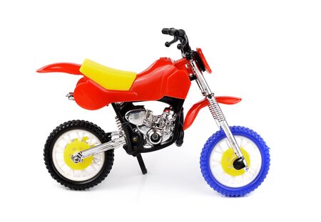 Toy motorbike isolated on white backgroundの写真素材