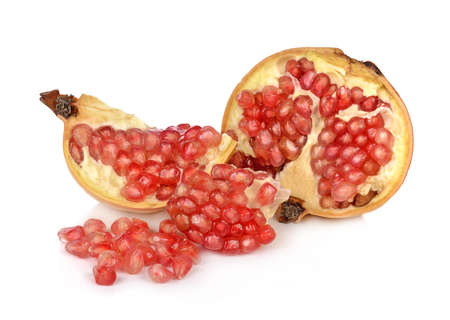 Ripe pomegranate fruit isolated on white backgroundの写真素材