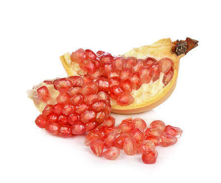 Ripe pomegranate fruit isolated on white backgroundの写真素材