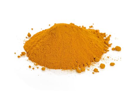 turmeric powder isolated on white background.の写真素材