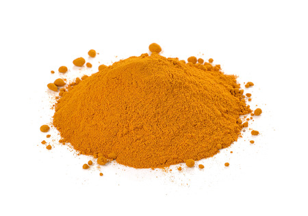 turmeric powder isolated on white background.の写真素材