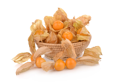 Cape gooseberry (physalis) in basket isolated on white backgroundの写真素材