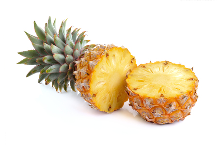 Juicy ripe sliced pineapple isolated on white backgroundの写真素材