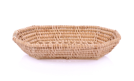 vintage weave wicker basket isolated on white backgroundの写真素材