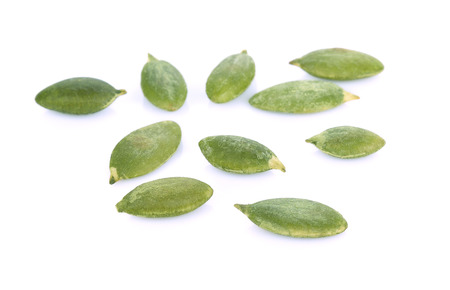 Pumpkin seeds on white backgroundの写真素材