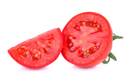 tomato slice isolated on white backgroundの写真素材