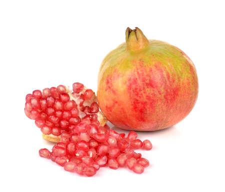 Ripe pomegranate fruit isolated on white backgroundの写真素材
