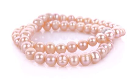 pearls necklace on white backgroundの写真素材