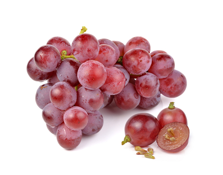 red grapes isolated on white backgroundの写真素材