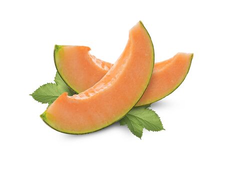  slices cantaloupe melon with green leaves isolated on white backgroundの写真素材