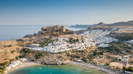 Aerial View of historic Village Lindos on Rhodes Greece Island including Acropolis on Rockの写真素材