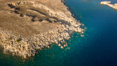 Aerial View of historic Village Lindos on Rhodes Greece Island including Acropolis on Rockの写真素材