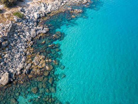 Aerial View: Drone video of iconic beach of Agathi and castle of Feraklos, Rodos island, Aegean, Dodecanese, Greeceの写真素材