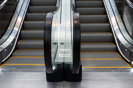 Close-up of the entrance to the interfloor escalator. There are two lifting stairs. Background.の写真素材