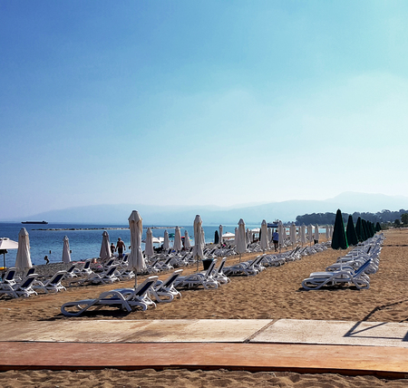 Sunbeds rows on the beach at the hotelのeditorial素材