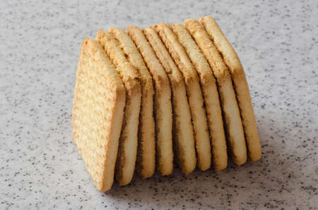 Rectangular shortbread cookies on a light marble top. Homemade baking.の写真素材