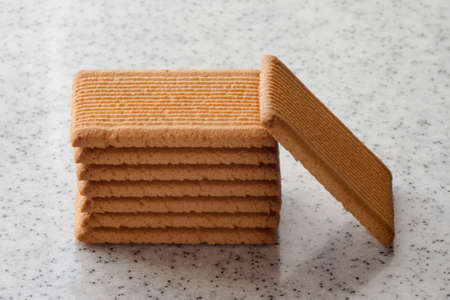 Rectangular shortbread cookies on a light marble top. Homemade baking.の写真素材