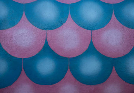 A set of colored spherical geometric shapes. Periodically repeating volumetric patterns on a colored backgroundの写真素材
