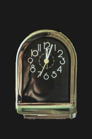 Desk clock on black background,