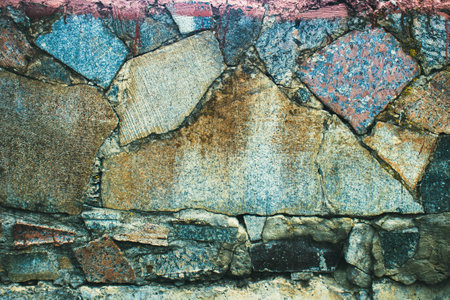 Old stone wall background texture close up. Abstract background for design.の写真素材