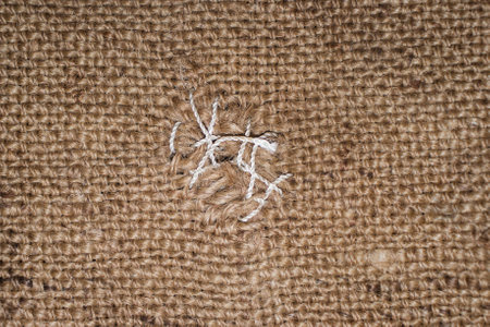 Embroidery on burlap background. Texture of burlap.の写真素材