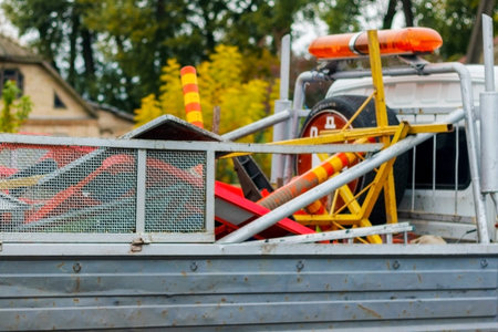 Road repair, the replacement of asphalt using machinery.